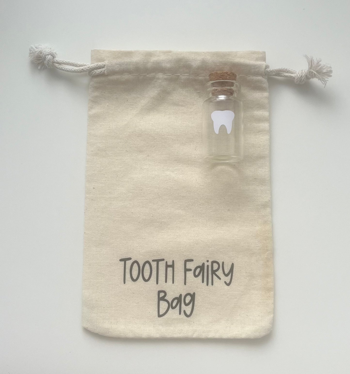 Tooth fairy bag with tooth bottle